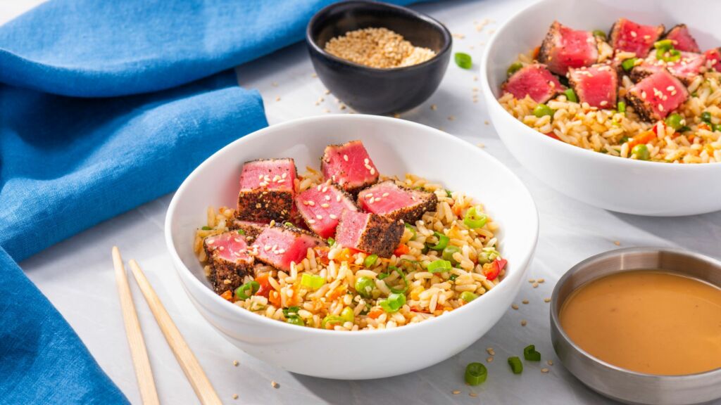 rice-bowl-topped-with-peppered-seared-tuna-and-poke-sauce-with-success-garden-and-grains